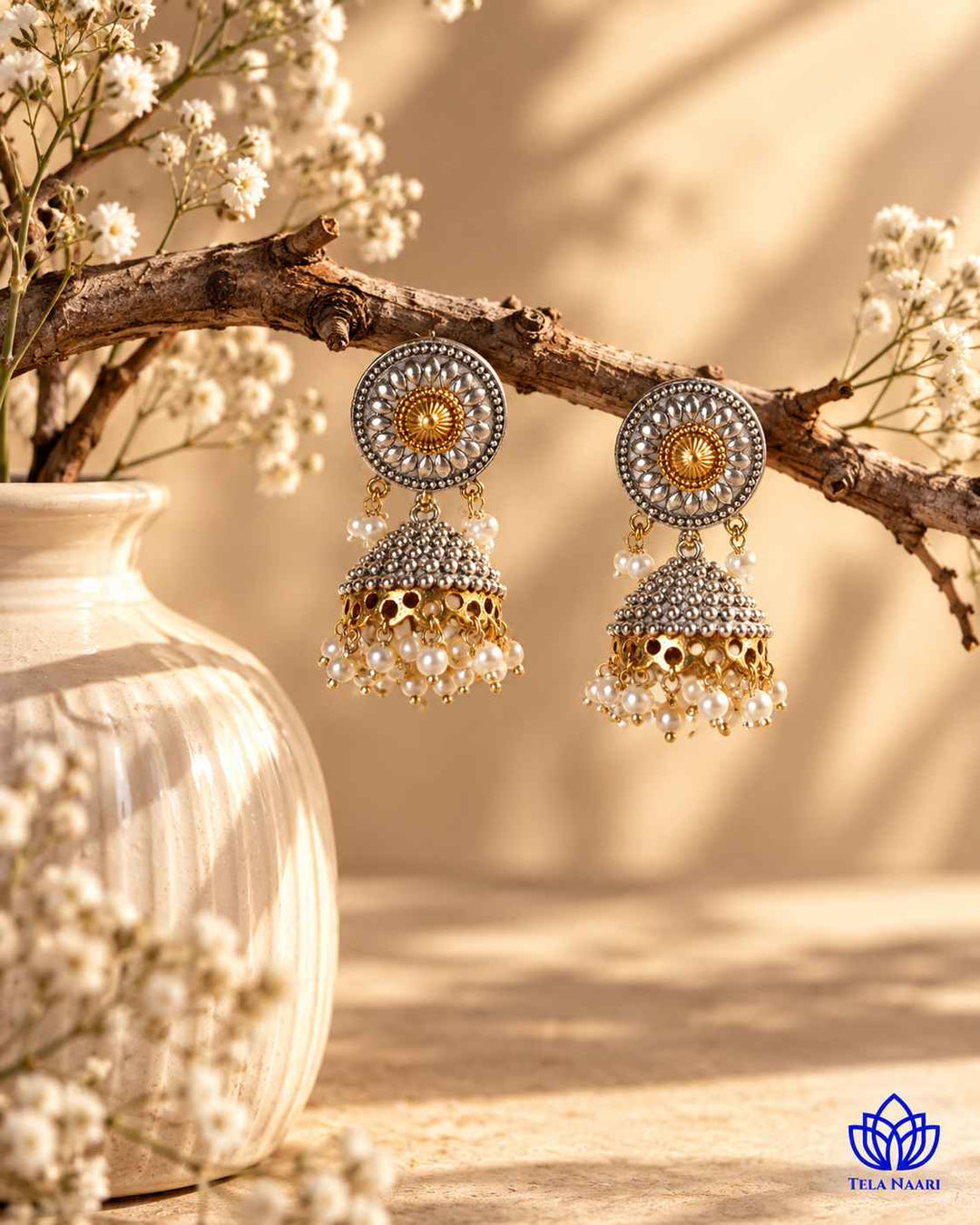 Renu Dual Tone Silver Plated Jhumka Earrings
