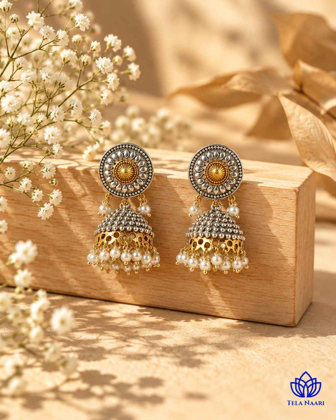 Renu Dual Tone Silver Plated Jhumka Earrings