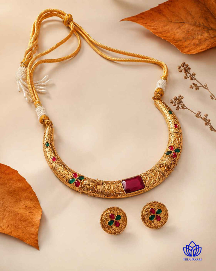 Nandita Gold Plated Red Green Stone Hasli Necklace Set