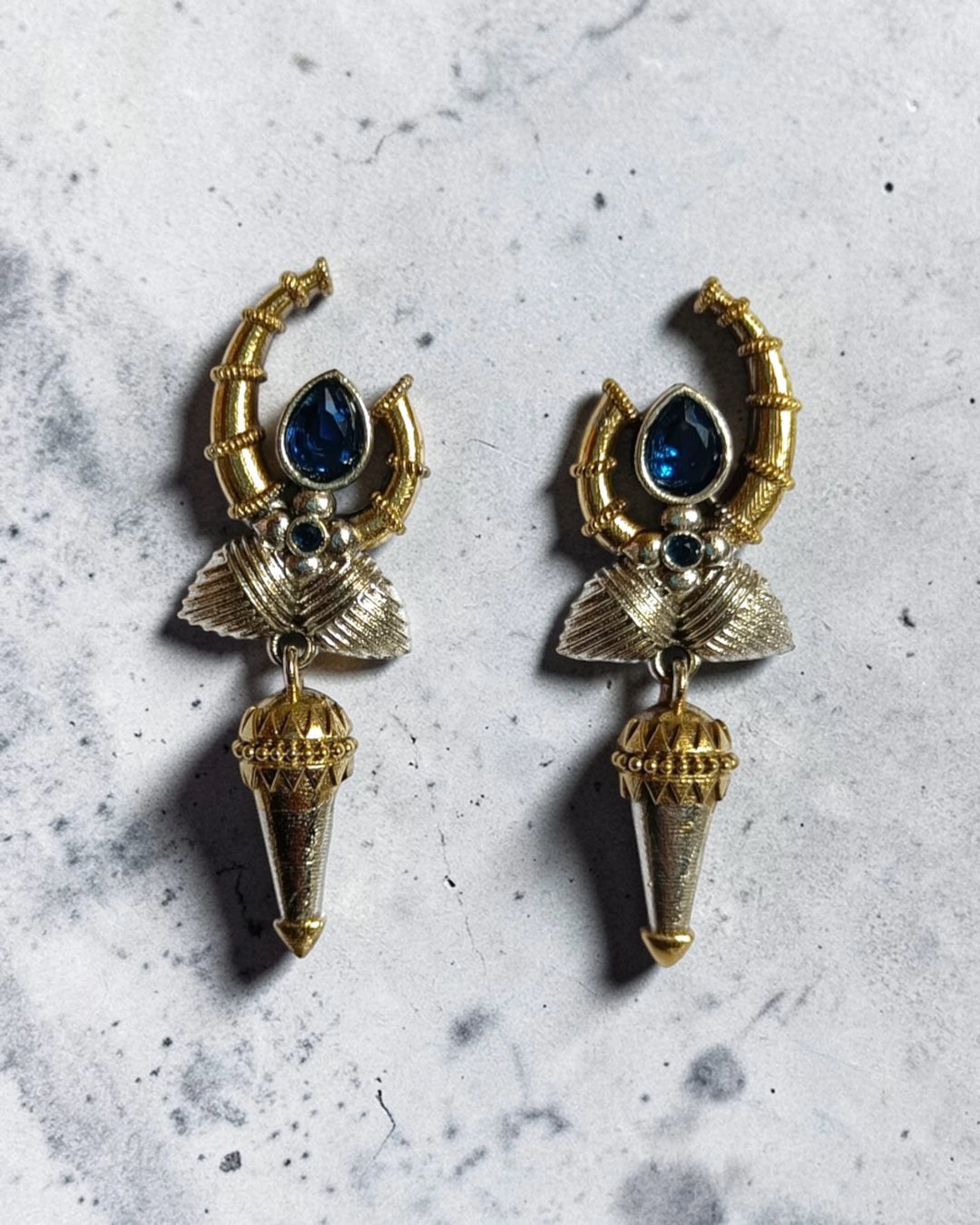Dual Tone Gilded Arc Ane Blue Statement Earrings