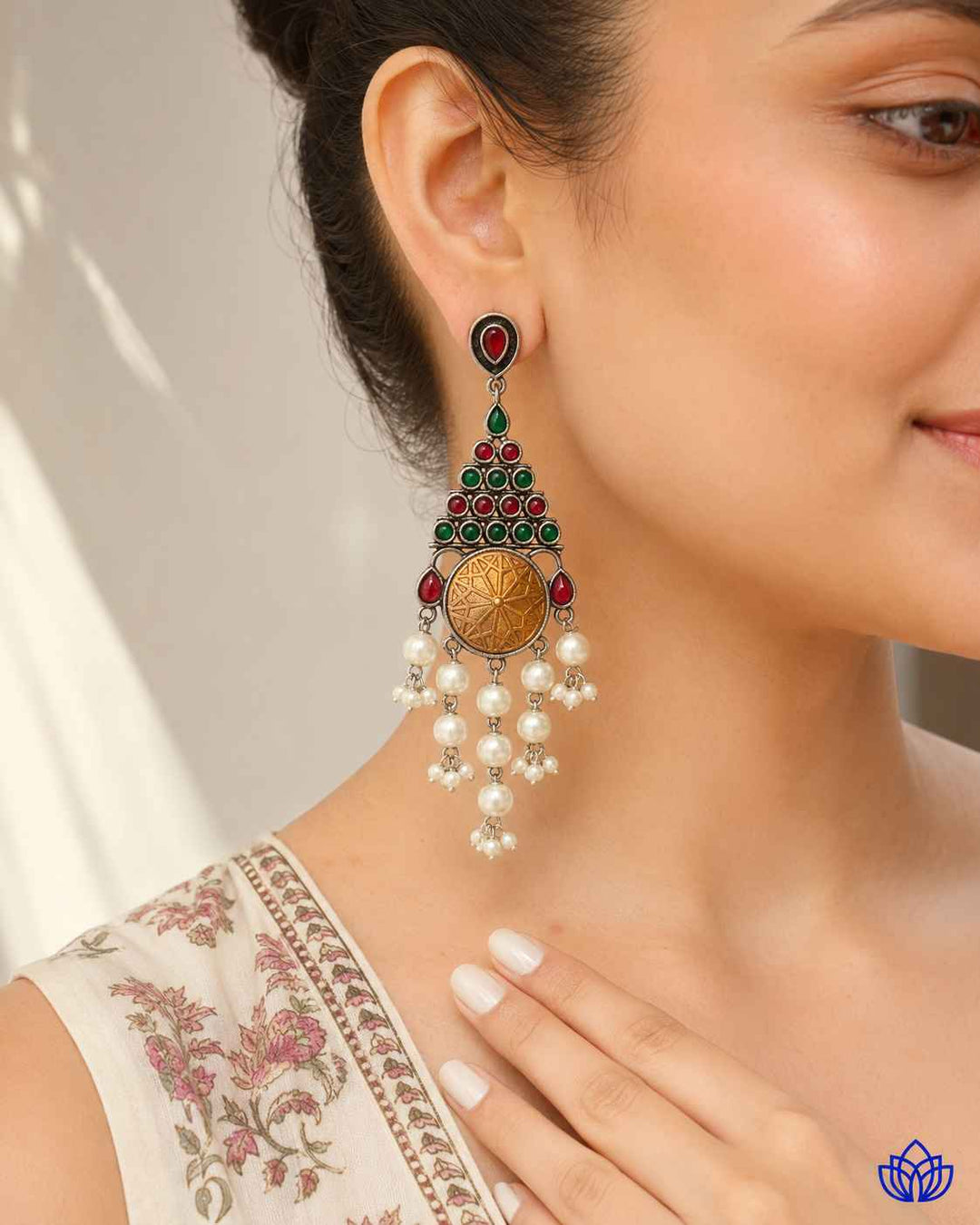 Everyday dangler earring blends warm and cool dual-tone shades.