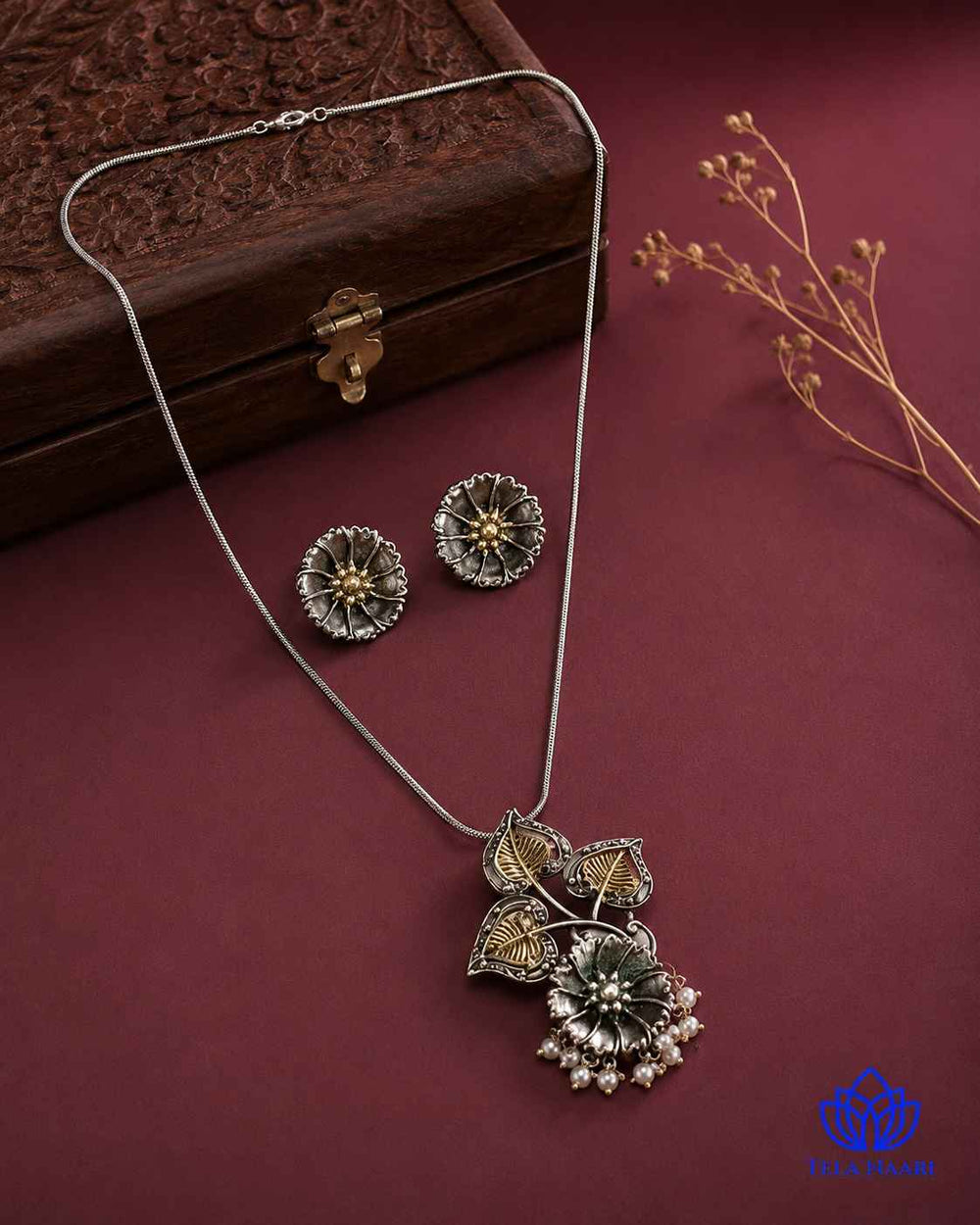 Silver-plated finish covers half of this fusion necklace.