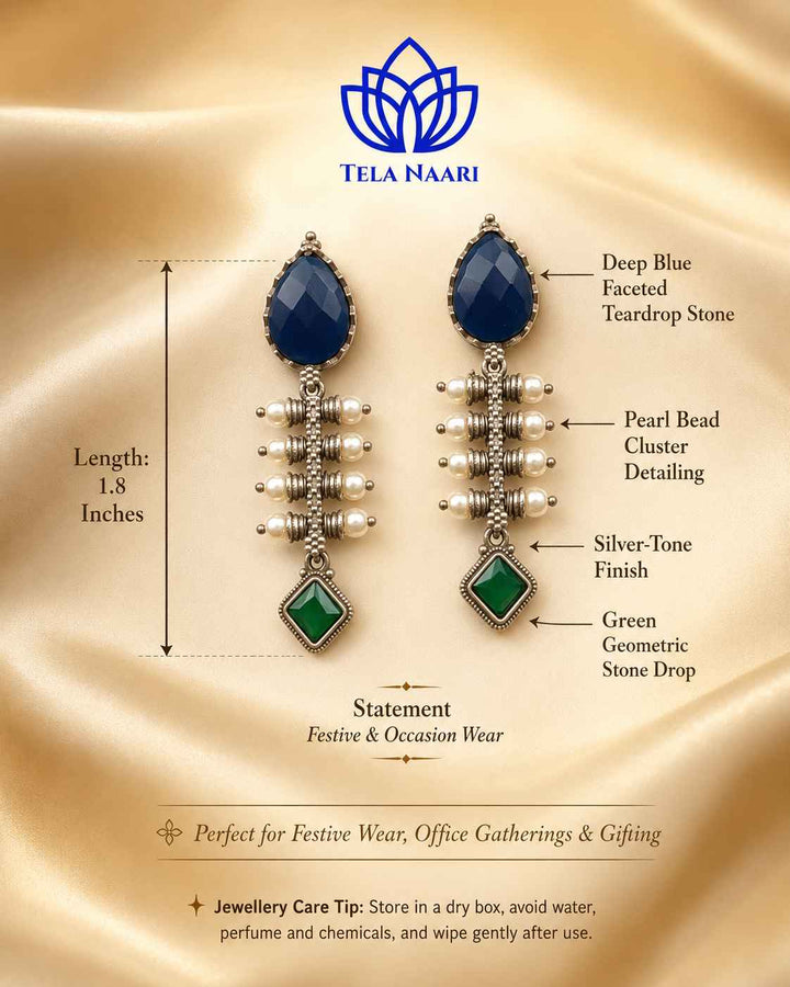 Artificial stone detailing decorates the surface of this teardrop earring.