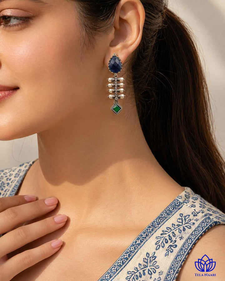 Rounded teardrop shape gives this earring its graceful silhouette.