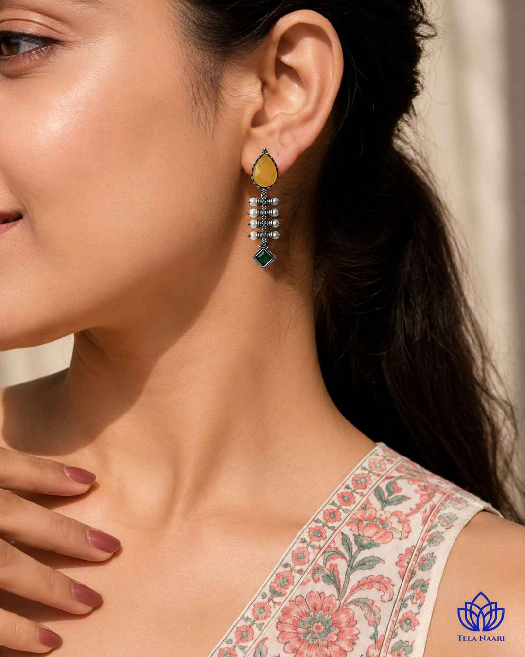 Silver-plated finish covers the smooth surface of this teardrop earring.