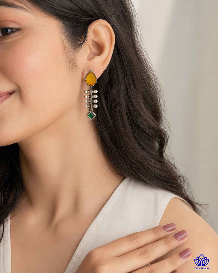 Rounded teardrop shape gives this earring its graceful silhouette.