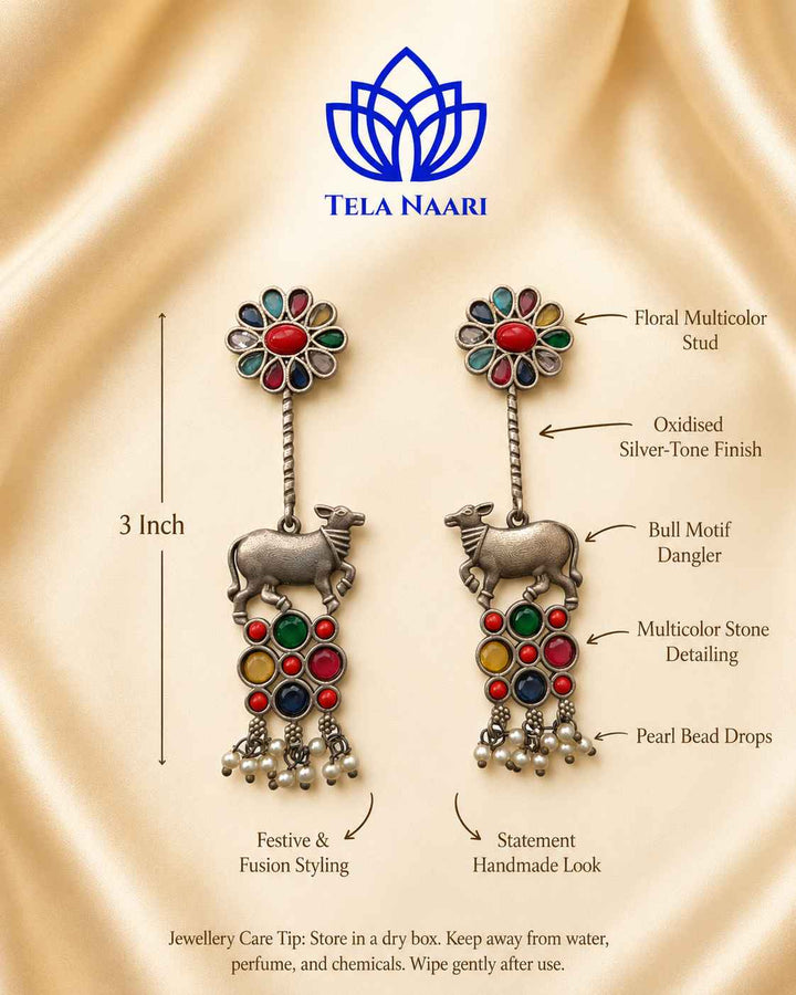 Push-back closure secures this oxidised Nandi earring in place.
