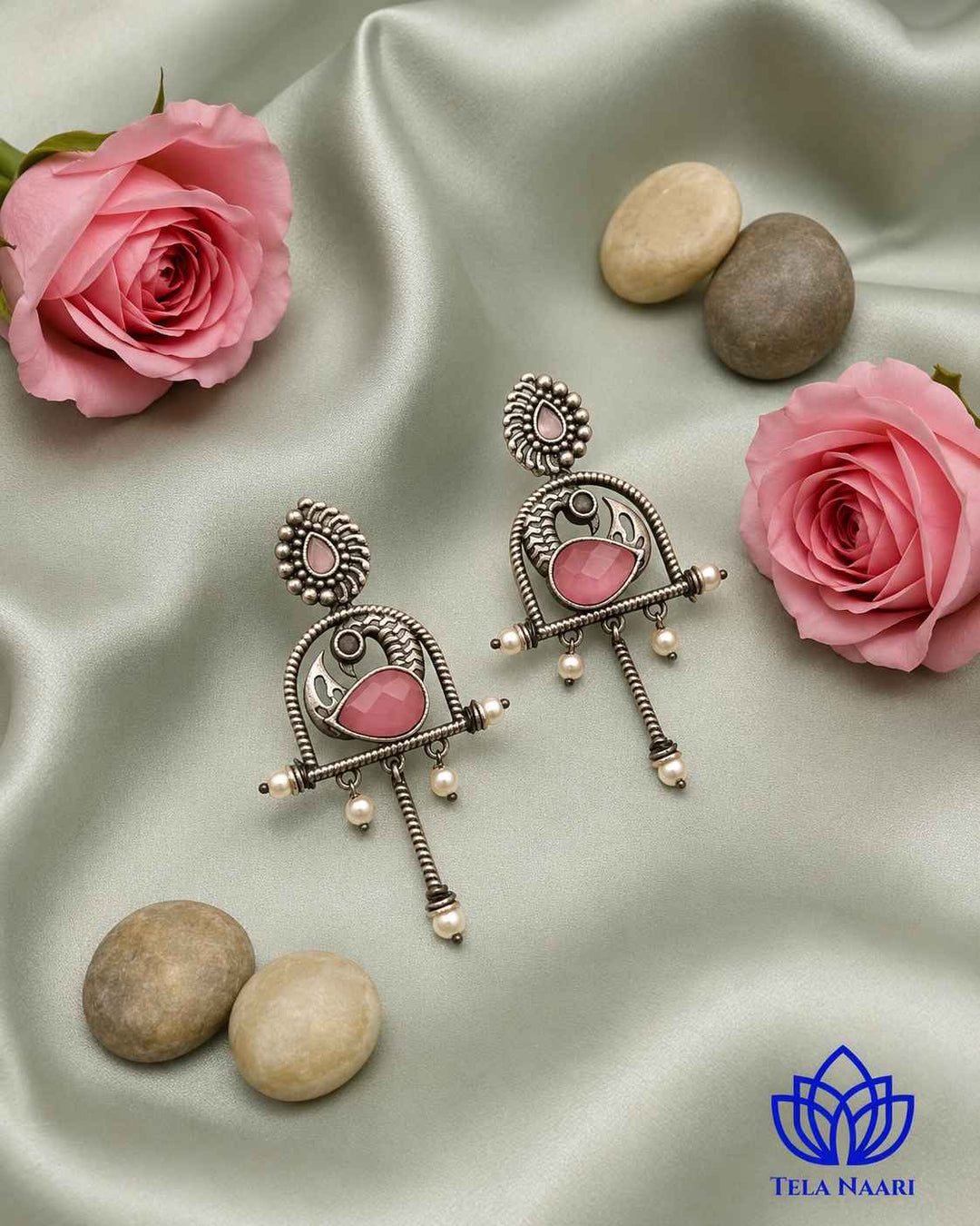 Textured surface combines glass beads with oxidised pink detailing.