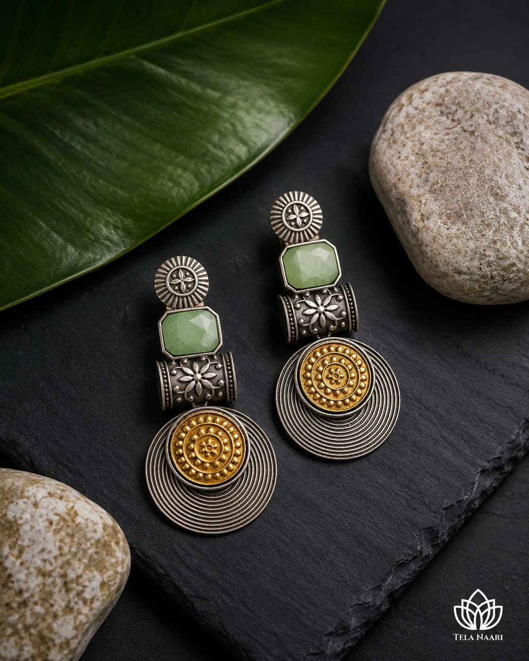 Brass construction supports the layered dual-tone plating of this earring.
