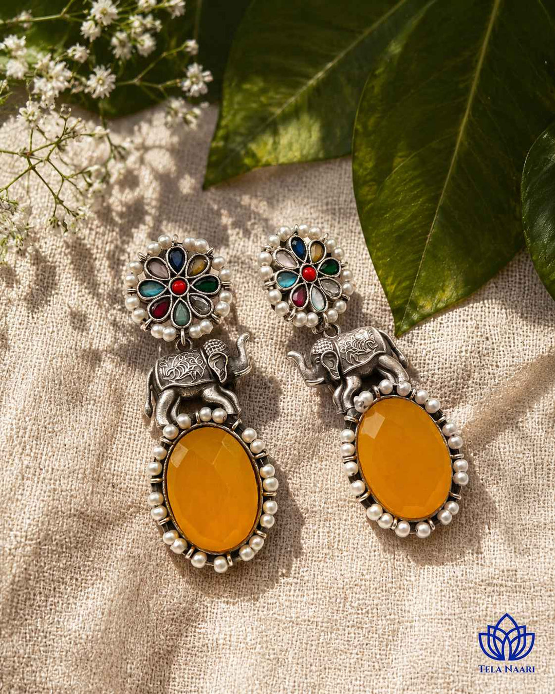Post and back closure keeps this elephant motif earring secure.