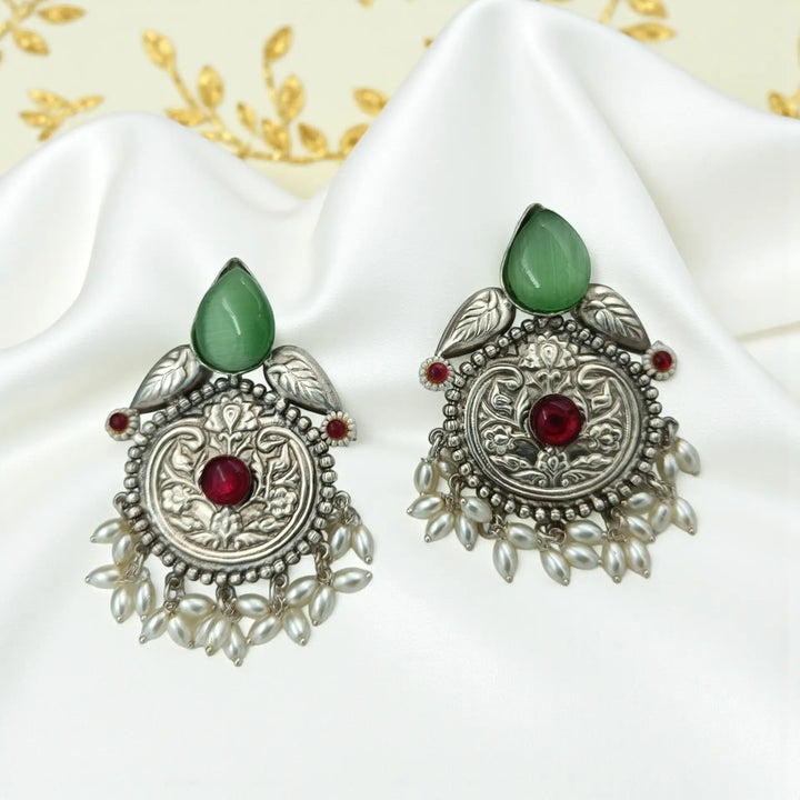 
Aasvi silver plated pearl earrings in light green – elegant handcrafted ethnic jewellery by Tela Naari
