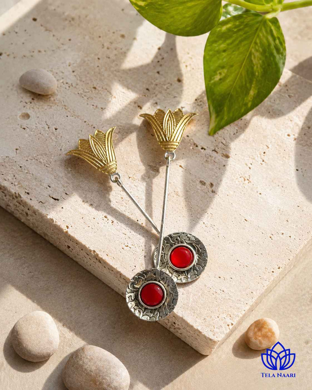 Delicate teardrop shape highlights the botanical-inspired design detail.