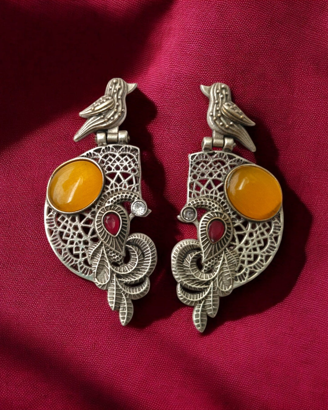 Detailed craftsmanship brings texture to this earring&