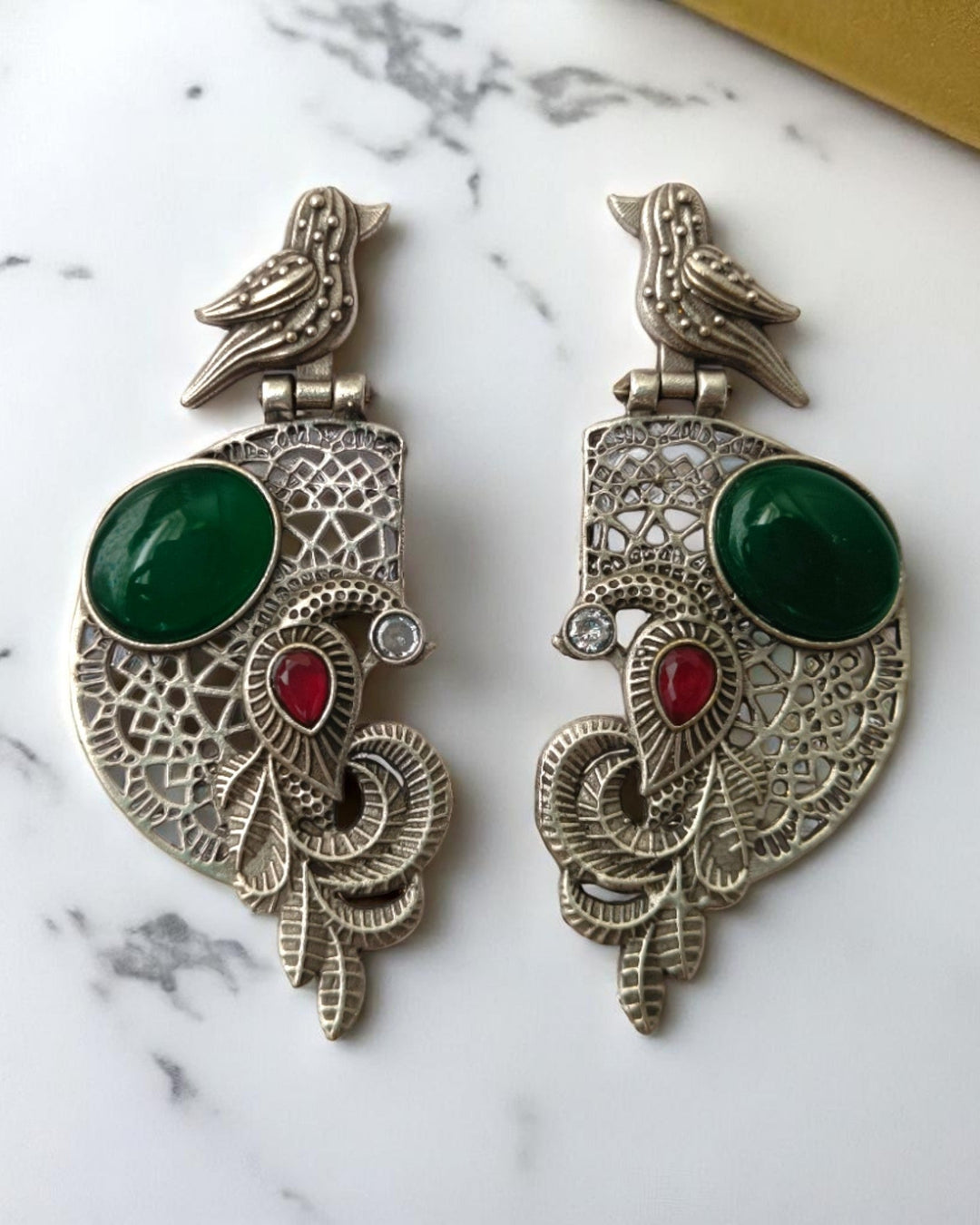 Oxidised finish gives this earring a lustrous antique shine.