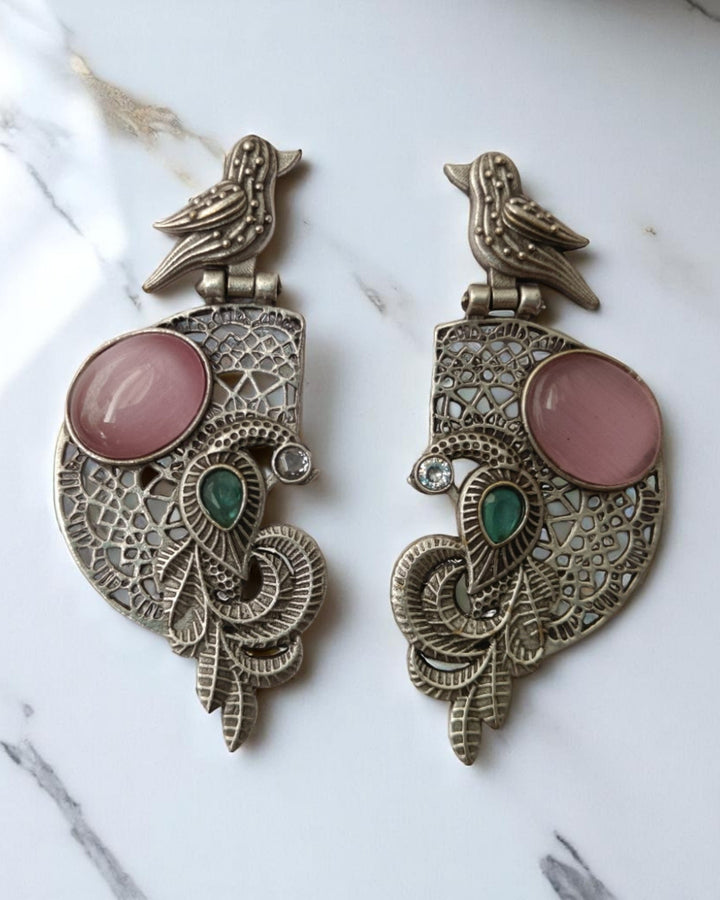 Enchanting detailing brings the bird motif to life in silver.