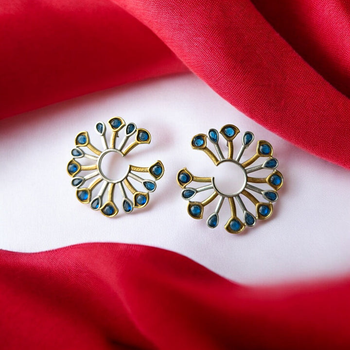Push back closure secures this dual-tone peacock earring in place.