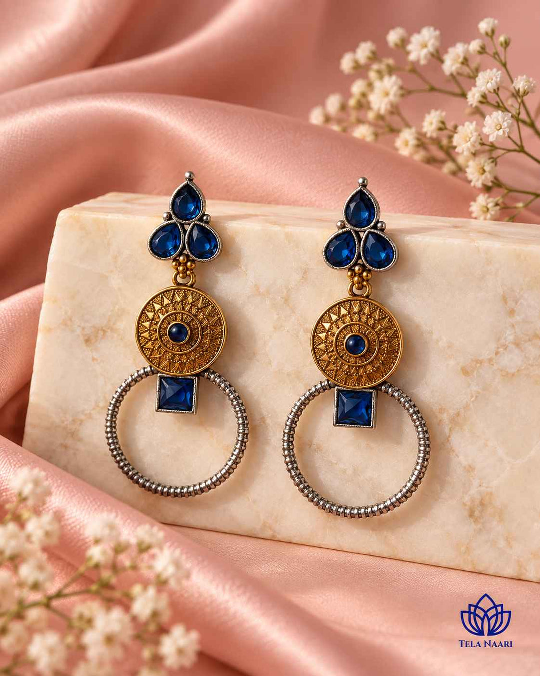 Serene blue tones shape the cool contrast of this earring.