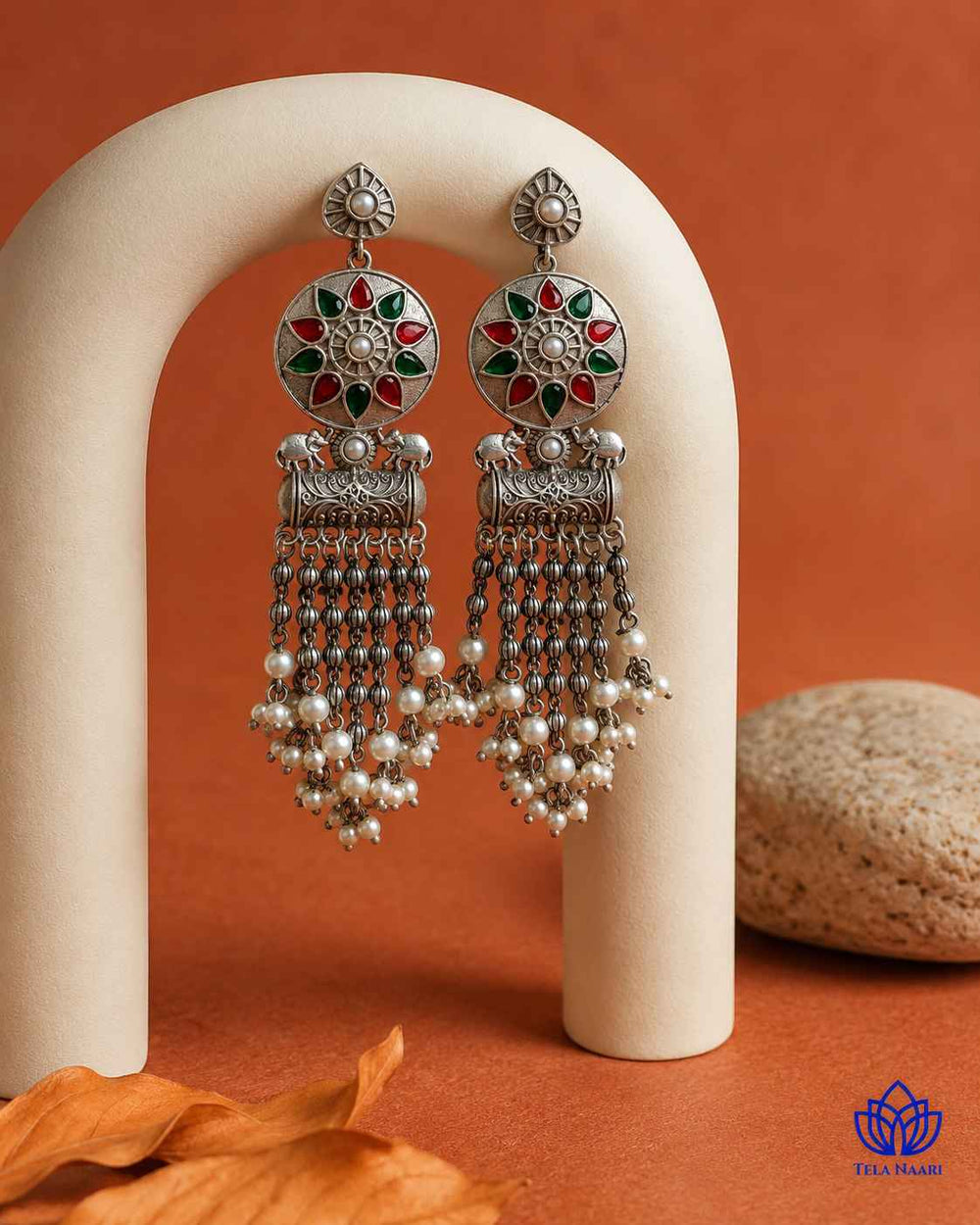 Silver-plated finish gives this earring a smooth, polished surface.