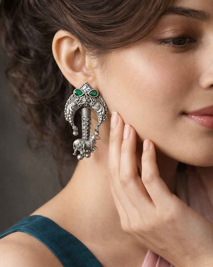 Yellow accent brings colour to this silver oxidised tusk earring.
