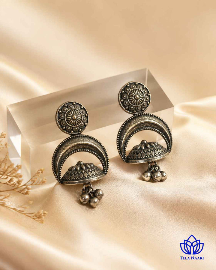 Oxidised finish gives this earring a textured antique surface.
