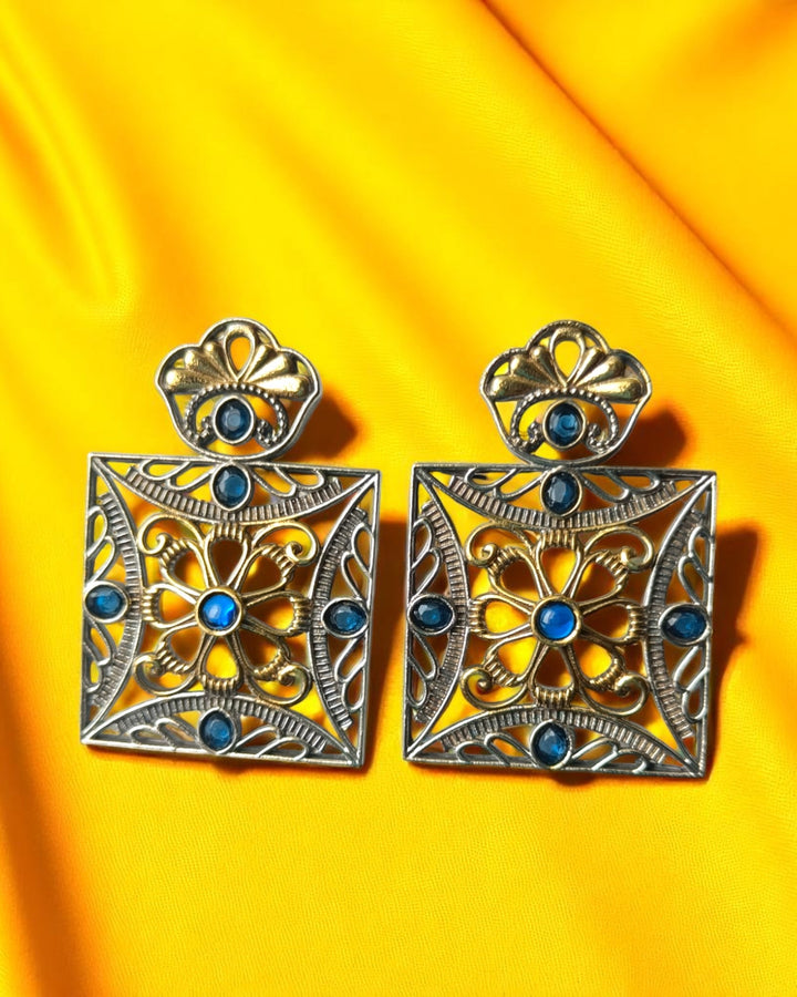 Angular lines define the geometric shape of this square earring.