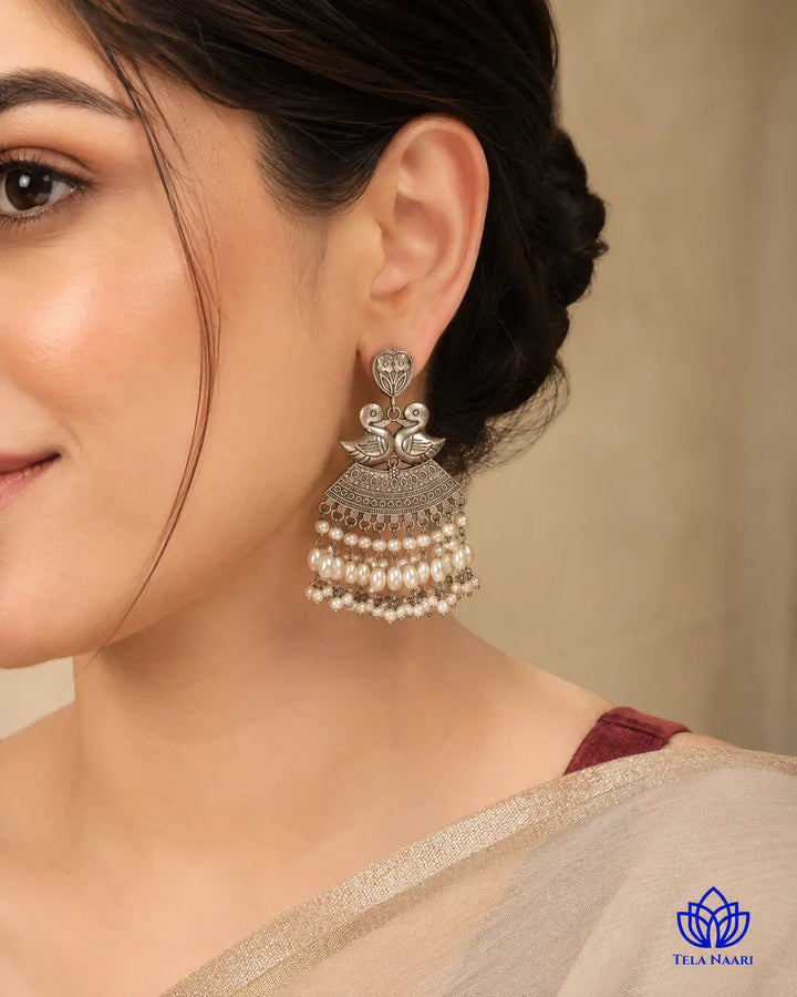 Antique silver-plated duck motif earrings by Tela Naari – view 5