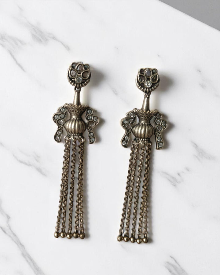 Cascading chain design creates dramatic movement in this oxidised earring.