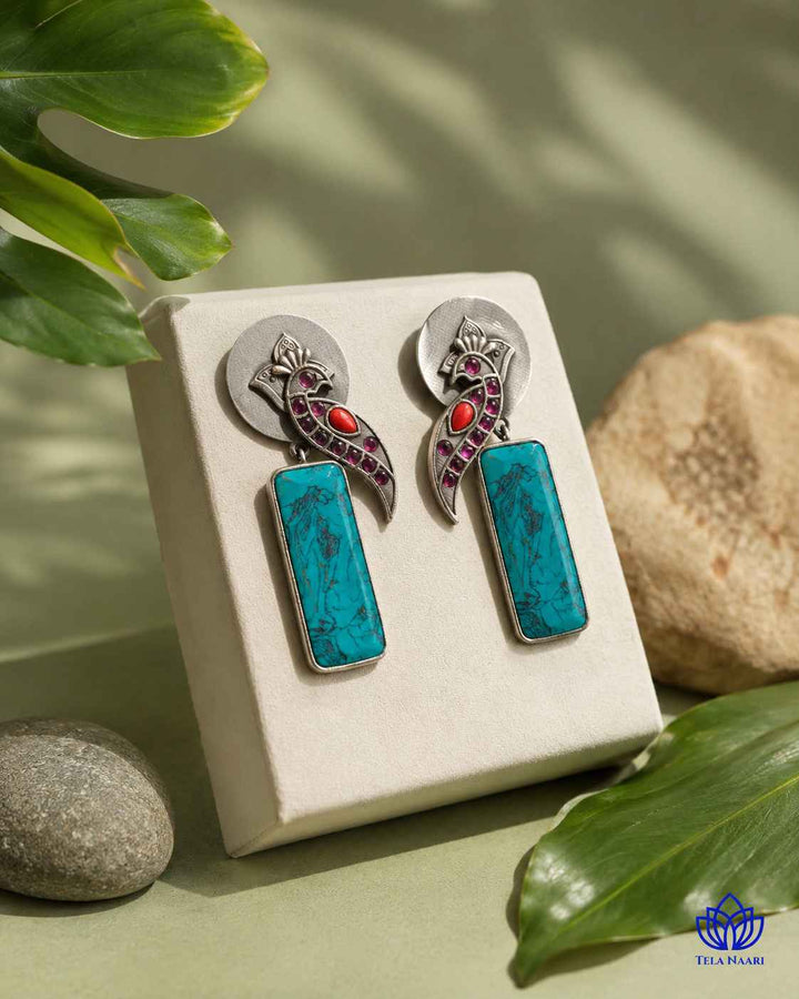 Textured surface combines glass beads with silver-plated detailing.