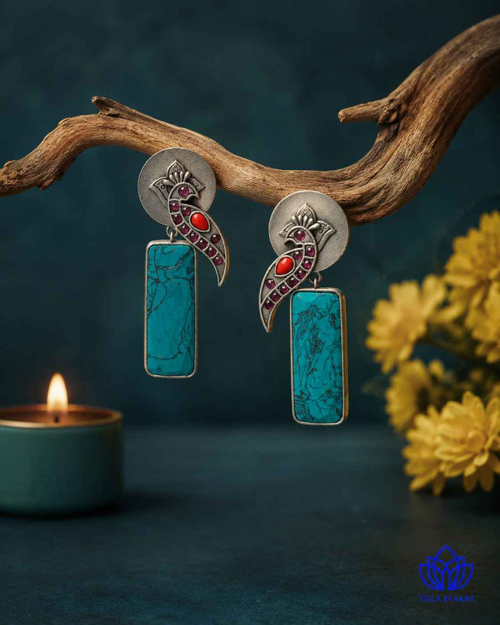 Vibrant stone detailing brings colour to this silver-plated earring.