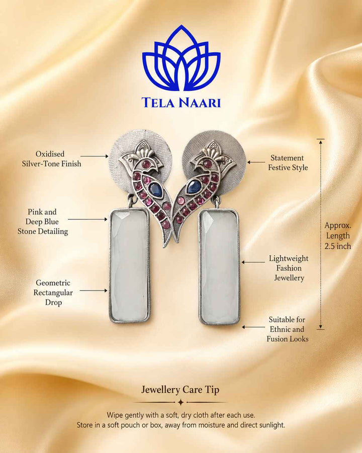 Artificial stone accents highlight the intricate texture of this earring.