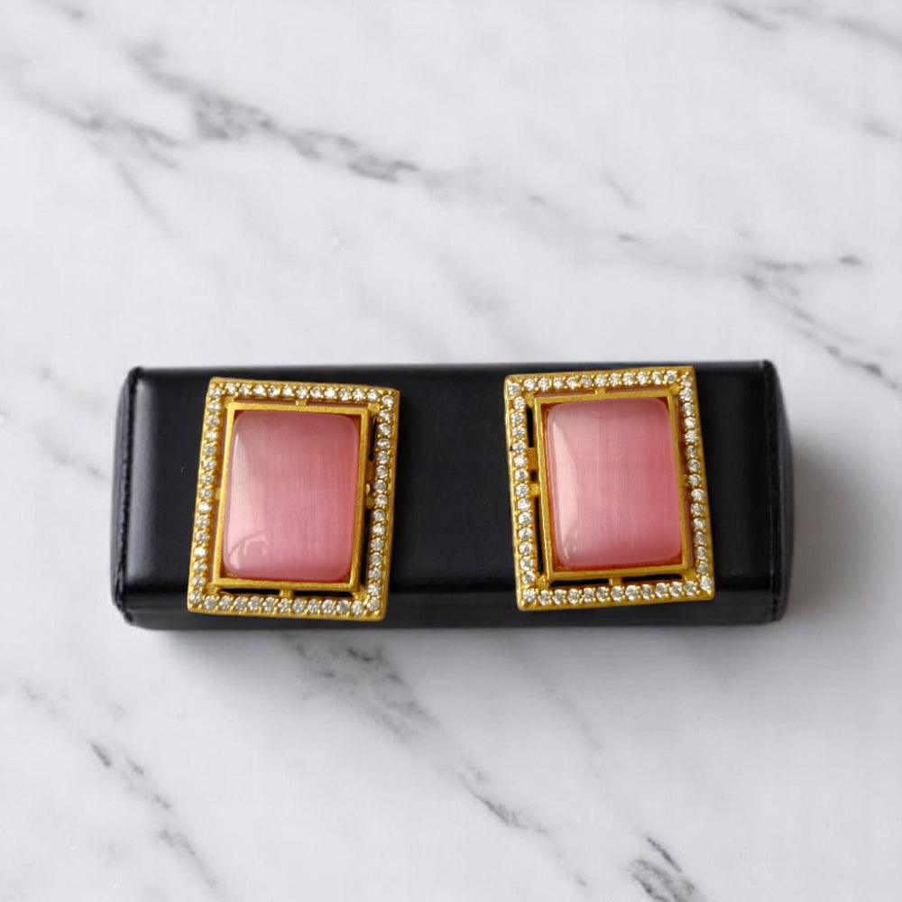 Matching earrings complete this blush pink gold-plated choker set.