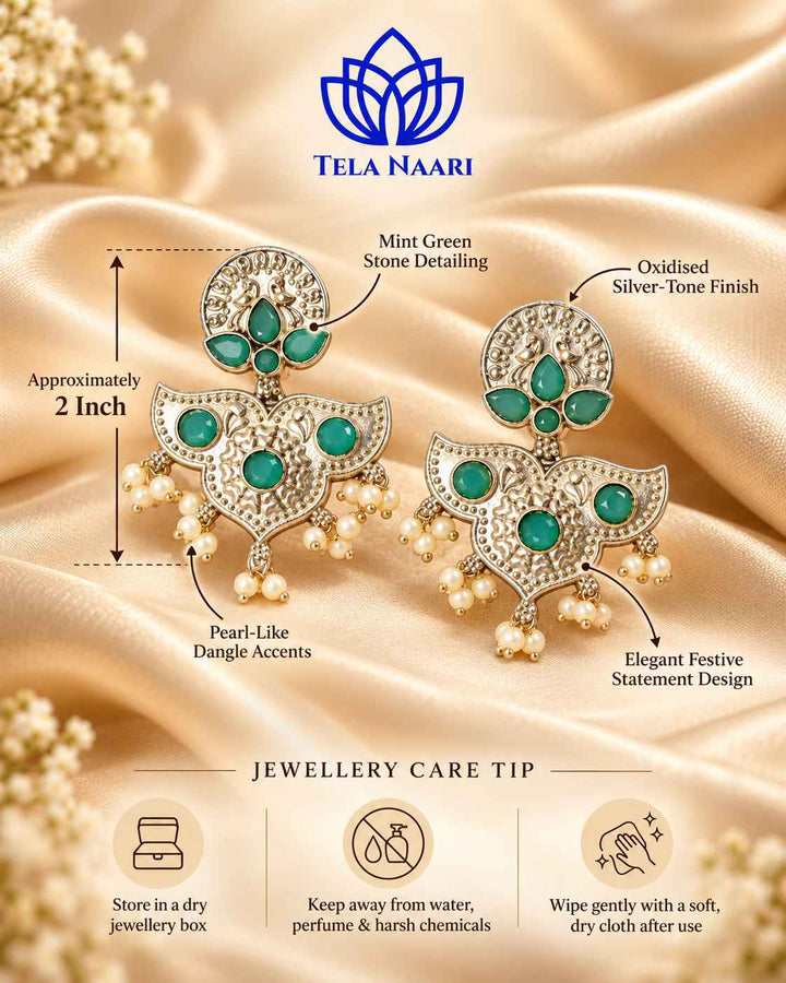 Brass construction supports the lightweight design of this earring.