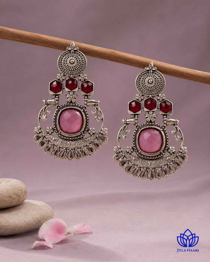 Delicate beadwork highlights the pink and silver colour combination.