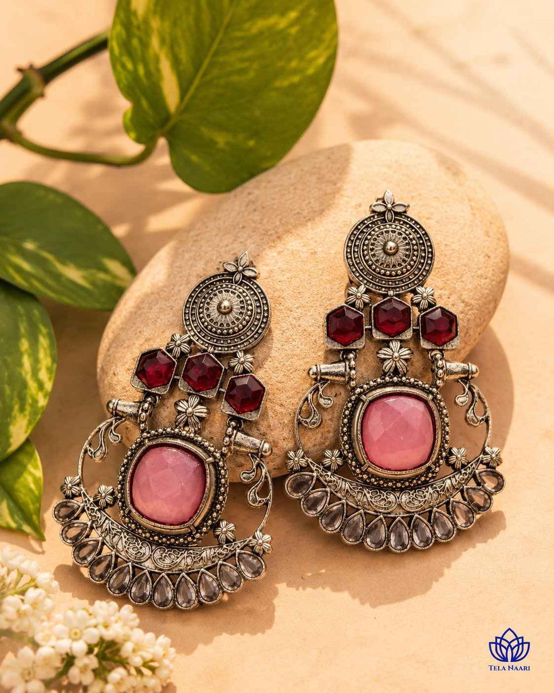 Polished plating catches the light across the earring&