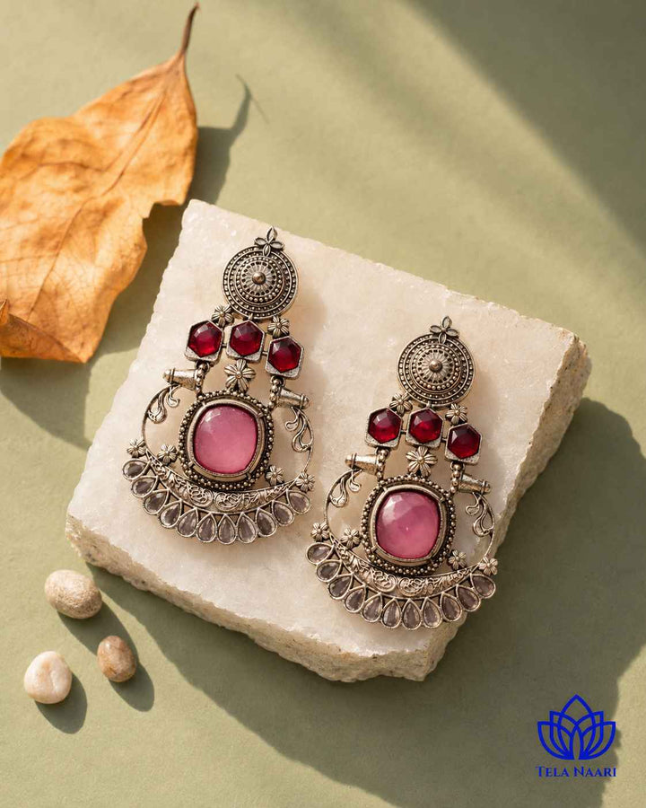 Silver-plated finish gives this earring a smooth, polished surface.
