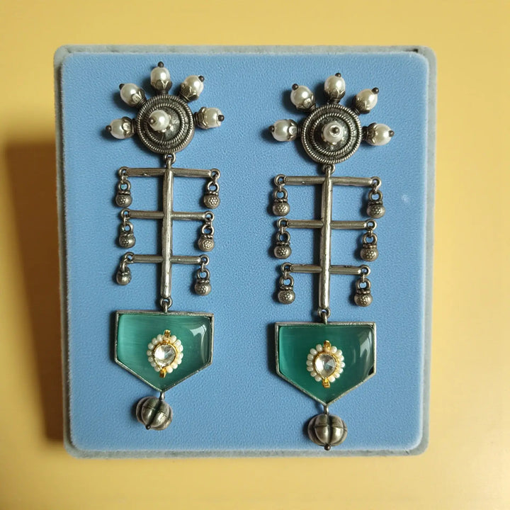Ayushka oxidised silver earrings in sea green — office-ready chic and casual ethnic looks; refined color pop for everyday elegance.
