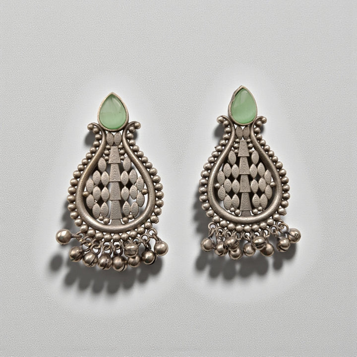 Umeshwari oxidised silver pearl earrings with green pearls — great for haldi, mehendi, and vibrant festive celebrations.
