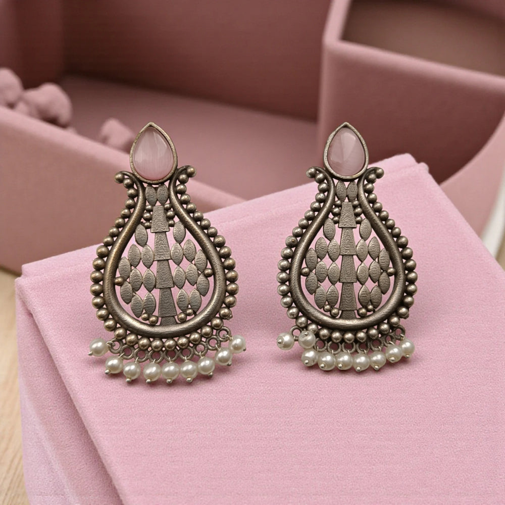 Umeshwari oxidised silver pearl earrings with pink stones — ideal for weddings, festive nights, and romantic evening looks.
