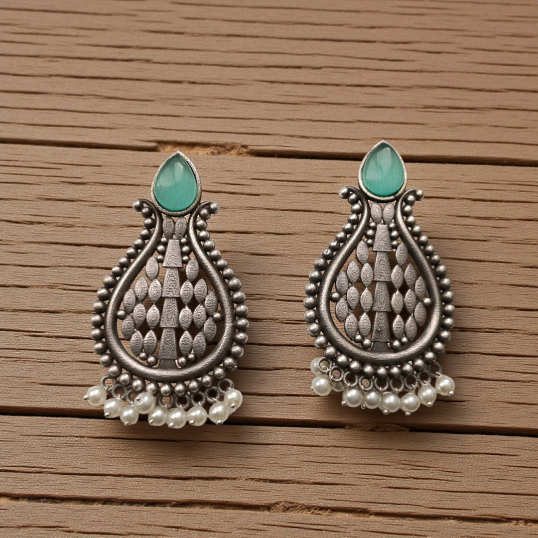 Umeshwari oxidised silver pearl earrings with sea-green pearls — for beach weddings, festive luncheons, and serene ethnic looks.
