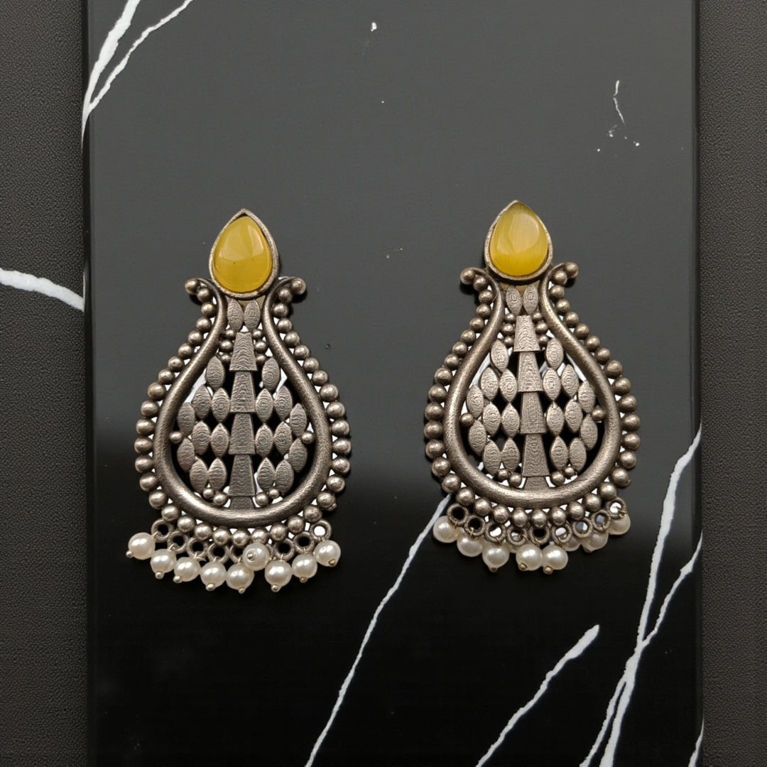 Umeshwari oxidised silver pearl earrings with yellow stones — crafted for sunny daytime events, haldi looks, and cheerful summer vibes.
