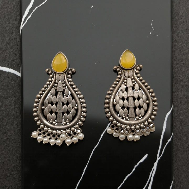 Umeshwari oxidised silver pearl earrings with yellow stones — crafted for sunny daytime events, haldi looks, and cheerful summer vibes.
