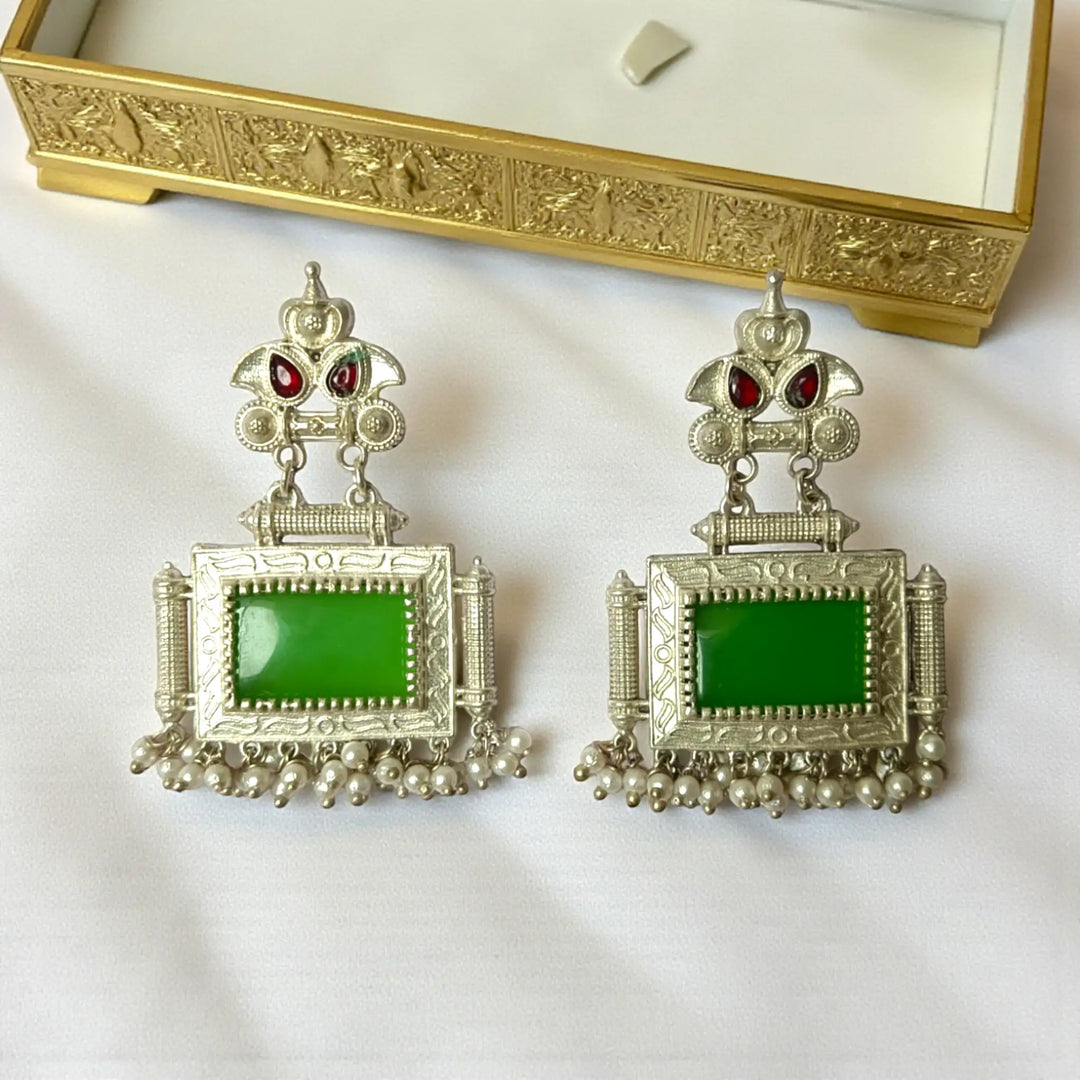 Bharati oxidised silver pearl earrings with green detailing — best for haldi, mehendi, and vibrant festive wear.
