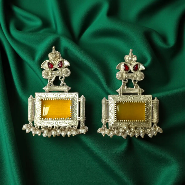 Bharati oxidised silver pearl earrings with yellow accents — bright for haldi events, daytime functions, and cheerful festive moods.
