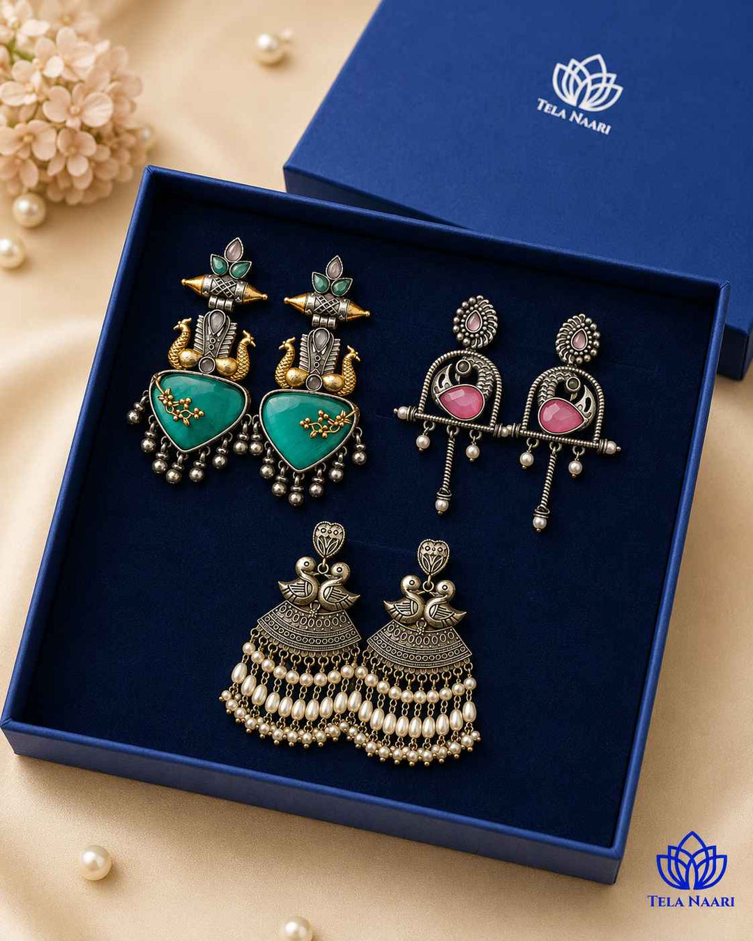 Cover shot: wedding, Raksha Bandhan, and Diwali Lily Hamper Premium Box with 3 Pairs of Earrings, silver-plated oxidised finish