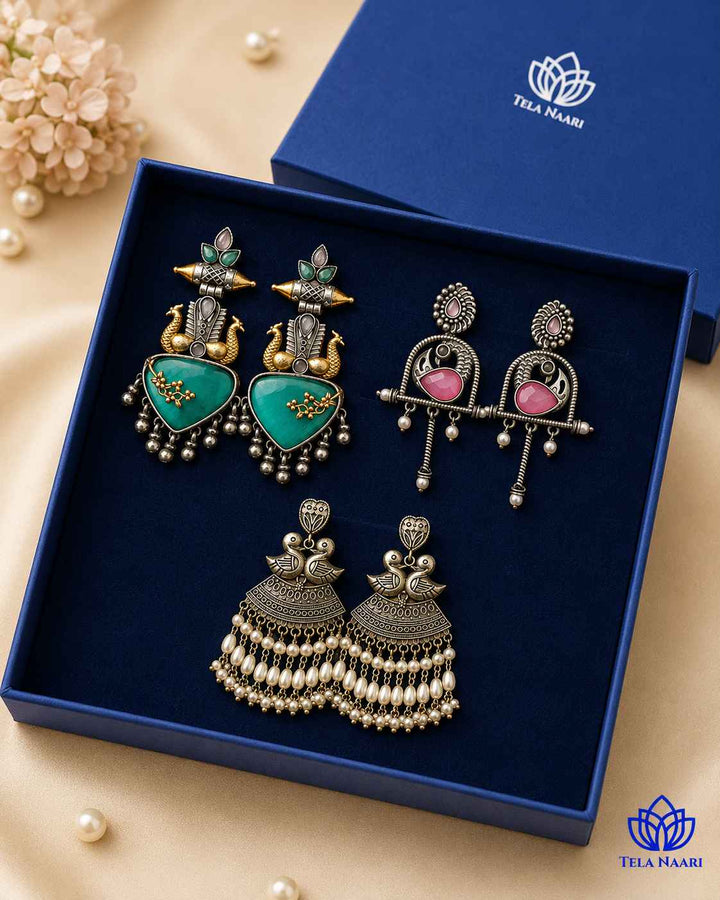 Cover shot: wedding, Raksha Bandhan, and Diwali Lily Hamper Premium Box with 3 Pairs of Earrings, silver-plated oxidised finish