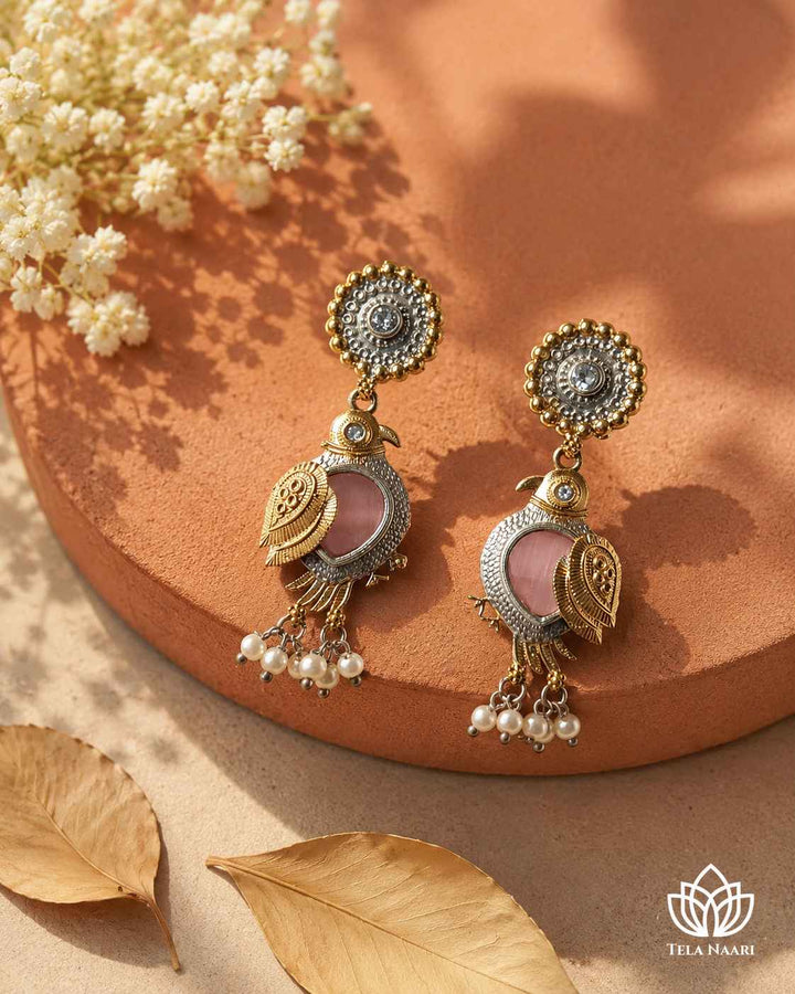 Push back closure keeps this bird-motif earring secure comfortably.