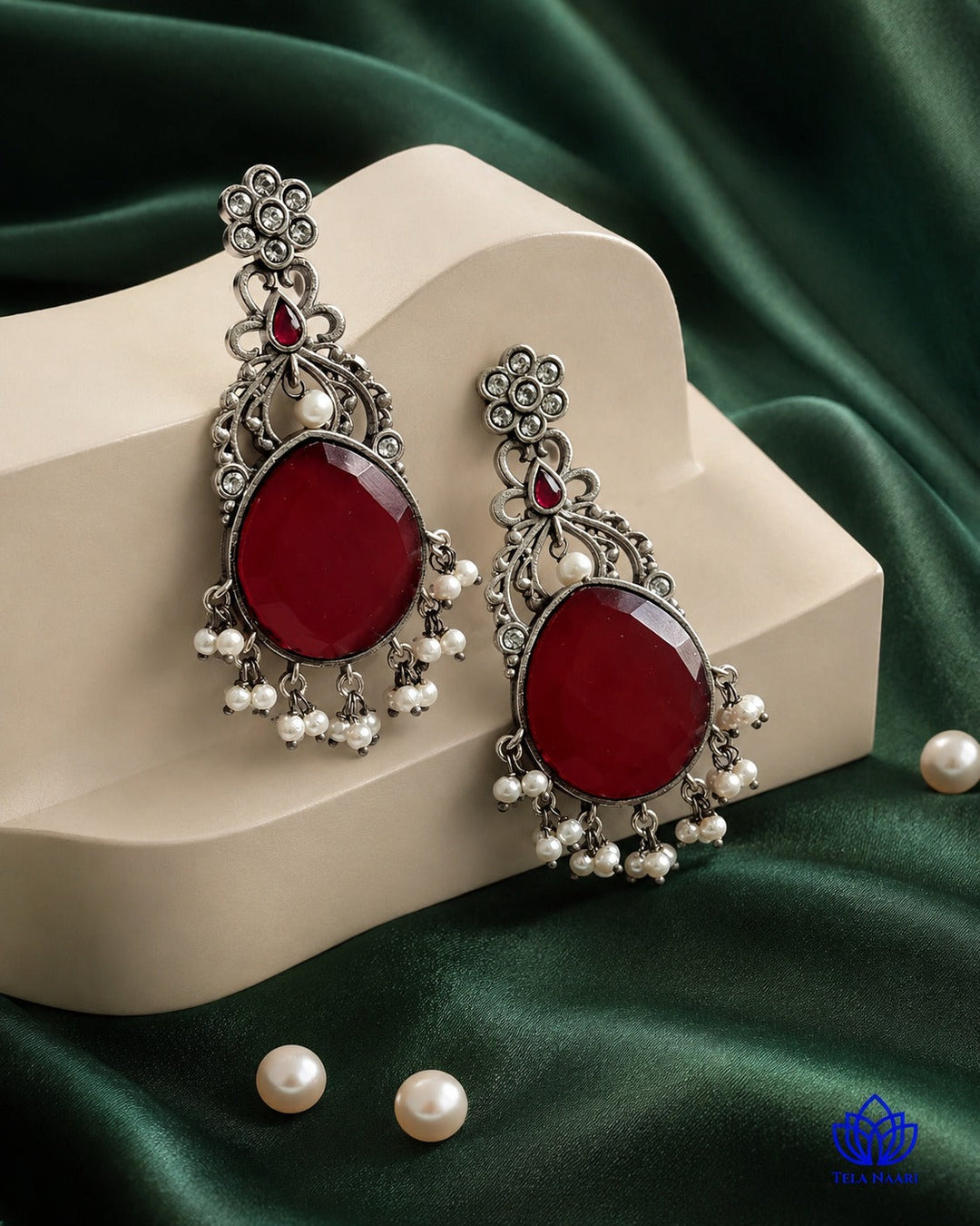 Glass bead accents add texture to this earring&