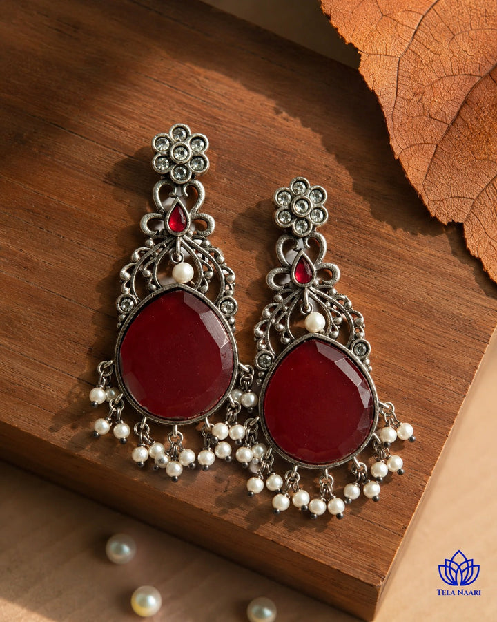 Polished plating catches the light across the earring&