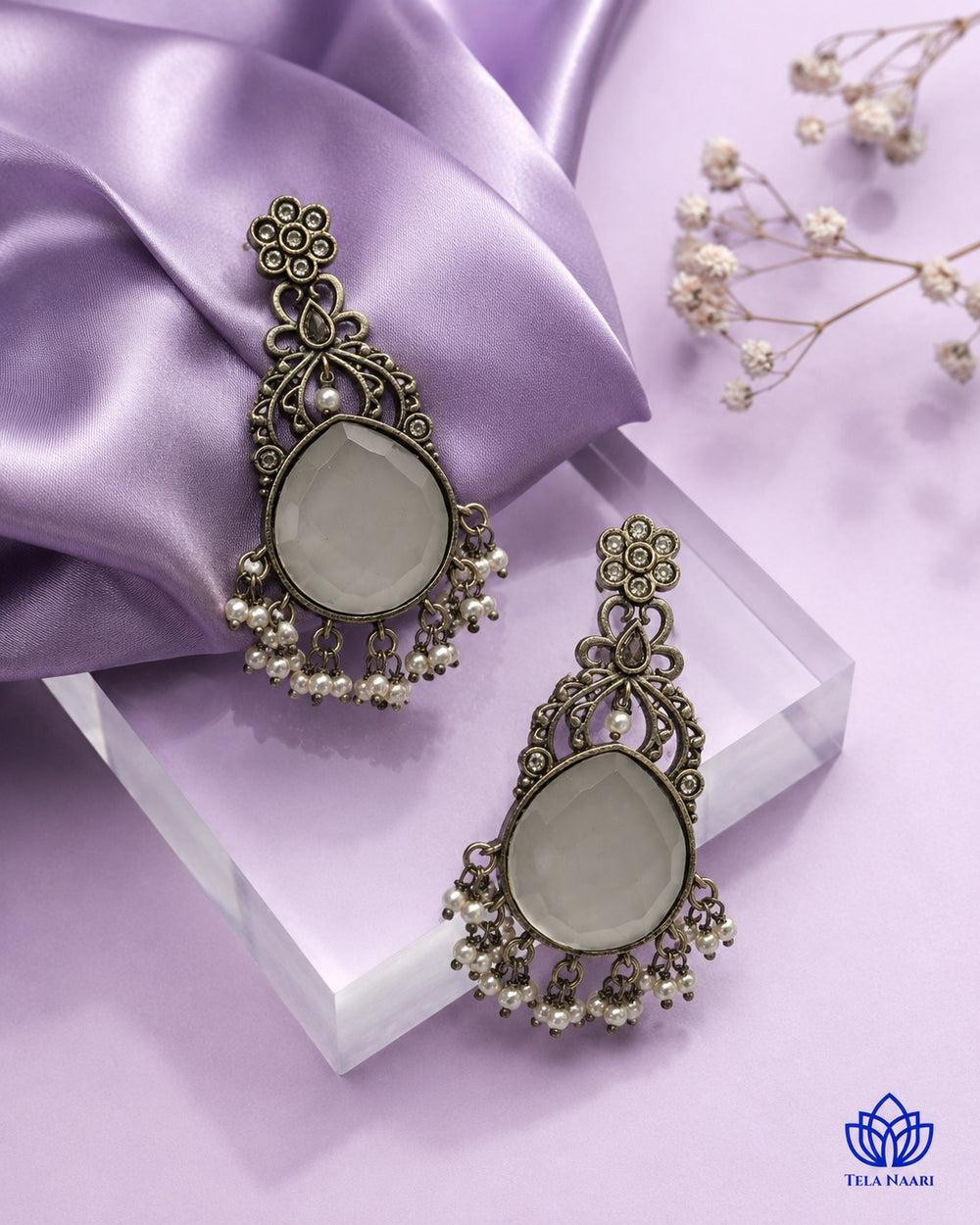 Silver-plated finish covers the surface of this stone earring.