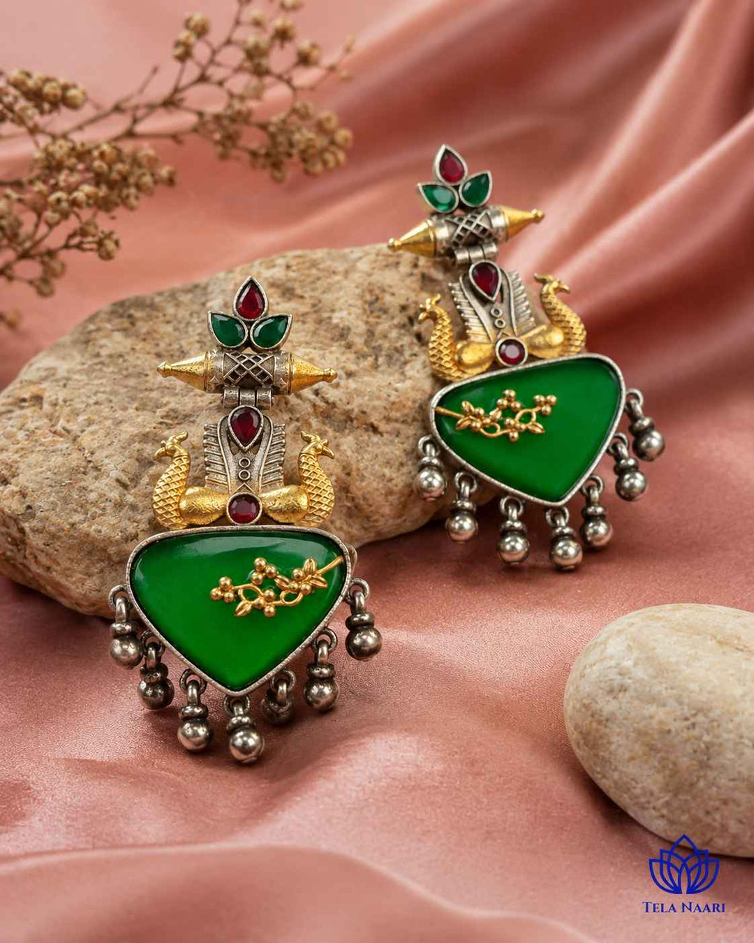 Dual-tone contrast pairs green tones with a silver-plated surface.